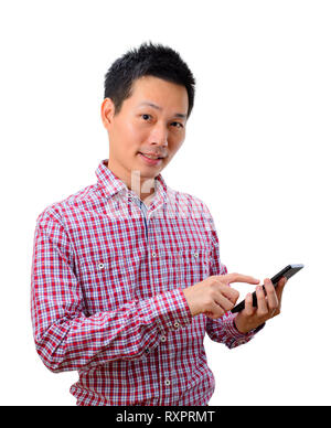 Young asian man using smartphone on white background Stock Photo