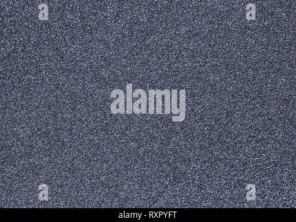 Rough metal surface, macro shot, monochrome, slightly toned Stock Photo