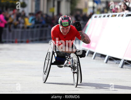 London, UK. 10th Mar 2019. The Vitality Big Half Marathon; David Weir crossing the finishing line in 1st place Credit: Action Plus Sports Images/Alamy Live News Stock Photo
