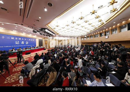 (190311) -- BEIJING, March 11, 2019 (Xinhua) -- Minister of Science and Technology Wang Zhigang, Vice Minister of Science and Technology Li Meng, Director-General of Department of Strategic Planning of the ministry Xu Jing, Director-General of Department of Policy, Regulation and Innovation System of the ministry He Defang, and Director-General of Department of Resource Allocation and Management of the ministry Zhang Xiaoyuan, attend a press conference on 'making China a country of innovators' for the second session of the 13th National People's Congress (NPC) in Beijing, capital of China, Mar Stock Photo