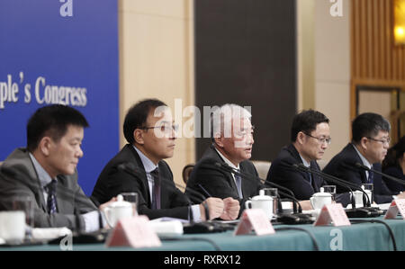 (190311) -- BEIJING, March 11, 2019 (Xinhua) -- Minister of Science and Technology Wang Zhigang (C), Vice Minister of Science and Technology Li Meng (2nd R), Director-General of Department of Strategic Planning of the ministry Xu Jing (2nd L), Director-General of Department of Policy, Regulation and Innovation System of the ministry He Defang (1st R), and Director-General of Department of Resource Allocation and Management of the ministry Zhang Xiaoyuan (1st L), attend a press conference on 'making China a country of innovators' for the second session of the 13th National People's Congress (NP Stock Photo
