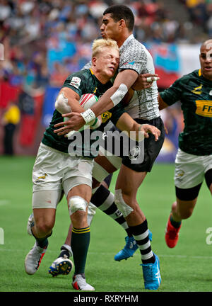 Vancouver, Canada. 10th Mar, 2019. JC Pretorius (L) of South Africa and Meli Derenalagi of Fiji compete in the HSBC World Rugby Seven Series at BC Place in Vancouver, Canada, March 10, 2019. Credit: Andrew Soong/Xinhua/Alamy Live News Stock Photo