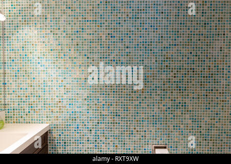 Glass tiled bathroom wall Stock Photo