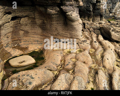 Rippled, smoothed and eroded rocks on Scottish beach near Elgol, Isle of Skye, Scotland, UK Stock Photo