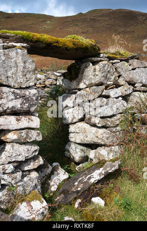 Doorway in ruins of old stone croft building, Boreraig, Isle of Skye, Scotland, UK Stock Photo