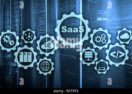 Software as a Service SaaS. Software concept. Modern technology model on a virtual screen server room background. Software On Demand. Stock Photo