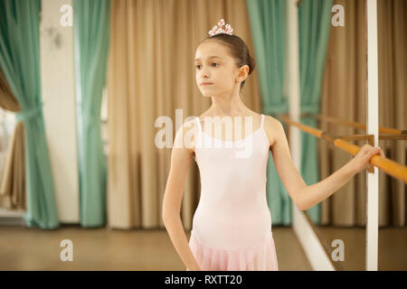 Little ballerina in ballet studio Stock Photo