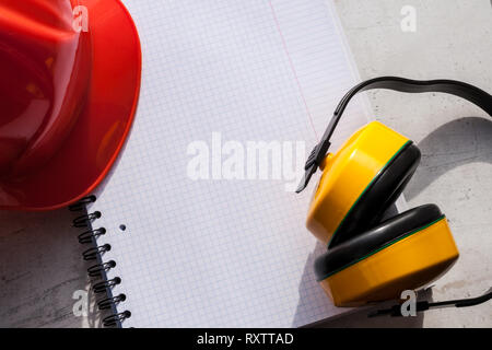 Construction helmet is a symbol of safety in the workplace. Set of tools. Safety concept Selective focus Stock Photo