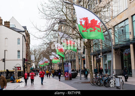 Cardiff, UK - March 9, 2019. People walking through the main shopping centre on a Rugby match day in Cardiff, UK Stock Photo