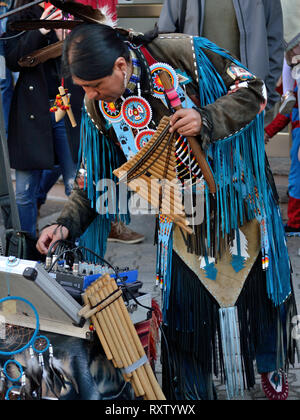 Female, indigenous,South American, street performer playing pan flute, Svilajnac, Serbia, Europe (Poklade, Bela Nedelja) Stock Photo