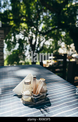 Close up white table setting in restaurant Stock Photo