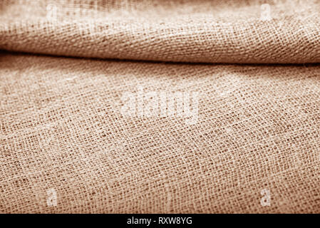 Burlap pleated texture as background. Stock Photo