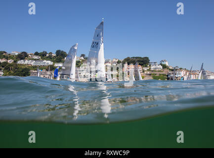 Under over water shot of Salcombe under a beautiful blue sky. Stock Photo