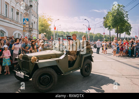 Gomel, Belarus - May 9, 2018: Red Army men in a military car passing through the intersection on Gomel Street on Victory Day, May 9 Stock Photo