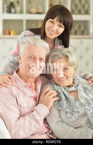 Portrait of happy family posing at home Stock Photo