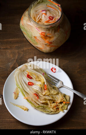 Kimchi on wooden background Stock Photo