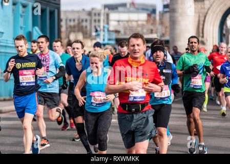 Arlene Penfold 4364 running in the Vitality Big Half half marathon crossing Tower Bridge, London, UK. Fun runners Stock Photo