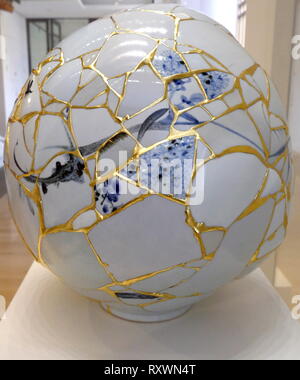 Translated Vase by Yeesookyung (b. 1963), Republic of South Korea, 2014. made from porcelain fragments, epoxy, lacquer, and gold leaf. The 'Translated Vase' series was first exhibited in 2001. The artist translates (recycles), rejected objects to make new, whole works. Stock Photo