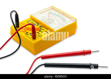 Yellow AC DC Analog Multimeter on white background. Stock Photo