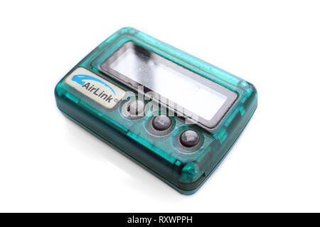 Old beeper pager device isolated on white background Stock Photo