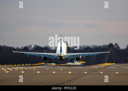 Dusseldorf International Airport, DUS, plane lands on the northern runway, Germany, Stock Photo