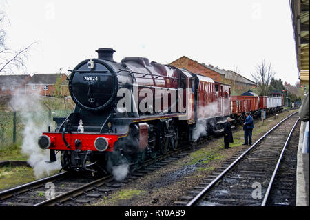 A Goods train passing through Loughborough Station on the The Great Central Railway Stock Photo