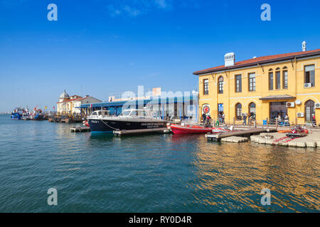 Izmir, Turkey - February 5, 2015: Coastal cityscape with Pasaport Dock and moored ships. Izmir city Stock Photo