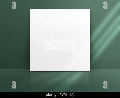 Blank white paper poster leaning at green color concrete wall and floor with window sunlight in perspective room,Business mock up presentation.Templat Stock Photo