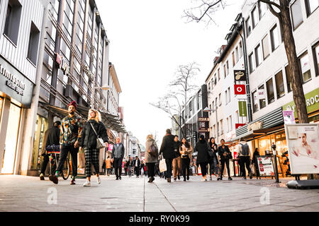 Nurmberg, GERMANY - February 27, 2019: Crowd of people walking on th shopping street. Stock Photo