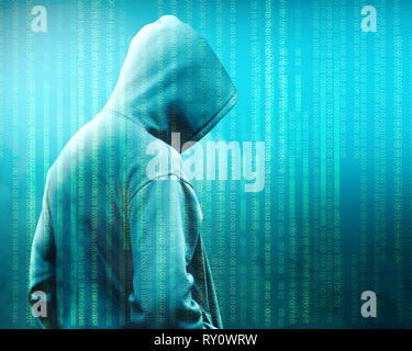 Rear view of hacker in black hoodie standing with binary code over green background Stock Photo