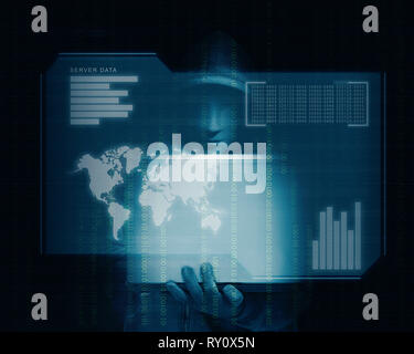 Hacker in black hoodie holding laptop with his hand and virtual screen display the server data, world maps, chart bar and binary code over dark backgr Stock Photo