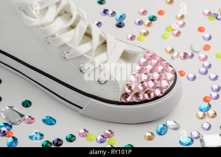 Bedazzled sneakers refashion Stock Photo