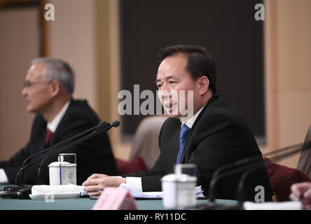 (190311) -- BEIJING, March 11, 2019 (Xinhua) -- Ecology and Environment Minister Li Ganjie attends a press conference on 'fighting resolutely to prevent and control pollution' for the second session of the 13th National People's Congress (NPC) in Beijing, capital of China, March 11, 2019. (Xinhua/Wang Peng) Stock Photo