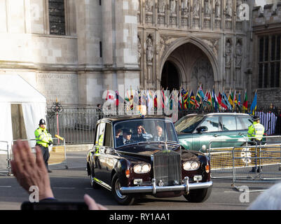 London, UK. 11th Mar, 2019. Prince Charles and The Duchess of Cornwall, Camilla, wave to the people outside, when leaving the Commonwealth Day service at Westminster Abbey, London, this afternoon. Credit: Joe/Alamy Live News Stock Photo