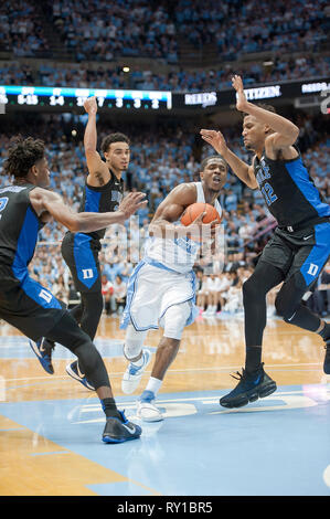 March 9, 2019 - Chapel Hill, North Carolina; USA - Carolina Tar Heels (24) KENNY WILLIAMS drives to the basket as the University of North Carolina Tar Heels defeated the Duke Blue Devils with a final score of 79-70 as they played mens college basketball at the Dean Smith Center located in Chapel Hill. Copyright 2019 Jason Moore. Credit: Jason Moore/ZUMA Wire/Alamy Live News Stock Photo