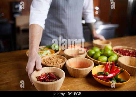 Chef Choosing Spices Stock Photo