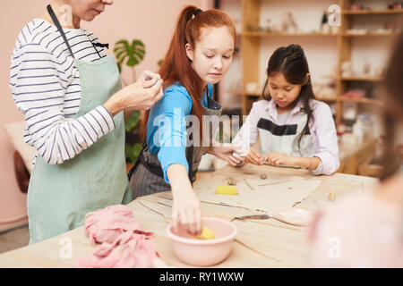 Girls in Pottery Class Stock Photo