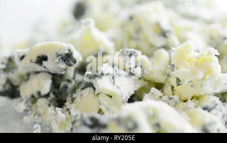 Macro Shot of a Grated Blue Cheese with Visible Cultures of the Mold Penicillium. Stock Photo