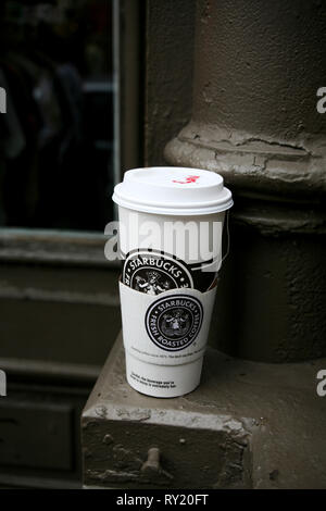 STARBUCK used coffee mug Stock Photo