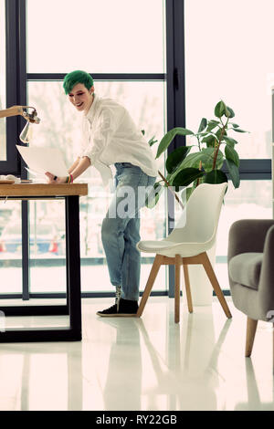 Beautiful nice woman being involved in her work Stock Photo