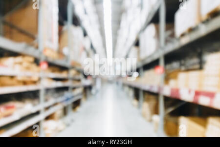 Blurred Background Image of Shelf in Warehouse or Storehouse, inventory product stock for logistic background for Shop and Store management backdrop. Stock Photo