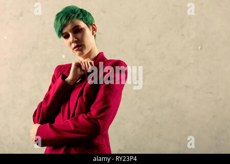 Nice attractive green haired woman looking at you Stock Photo