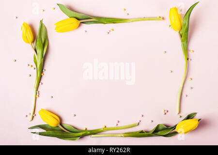 Frame of beautiful yellow tulips. Holiday mock up. Stock Photo