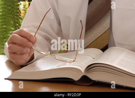 Working businessman in a white shirt in the office Stock Photo