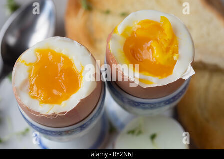 soft-boiled eggs on plate macro Stock Photo