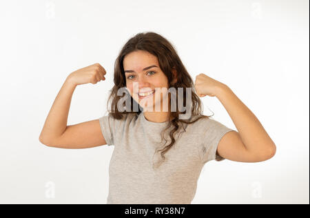 Portrait of beautiful shocked girl celebrating victory, having great success with surprised and happy Face and gestures. In Facial Expression, Human E Stock Photo