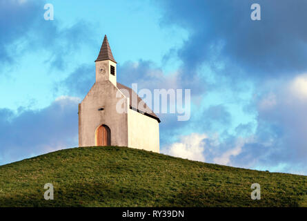 The little white chapel church on the hill. - Image Stock Photo