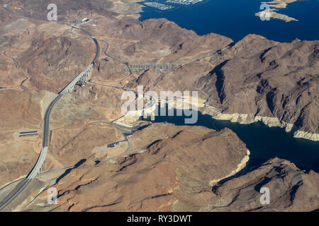 Aerial view of the Black Canyon and Hoover Dam on the Colorado River between Nevada and Arizona, USA shot from a plane window Stock Photo