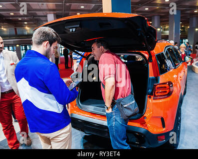 PARIS, FRANCE - OCT 4, 2018: Customers and curious people admiring the new Cietroen Red SUV at International car exhibition Mondial Paris Motor Show, model produced by French Citroen car maker Stock Photo