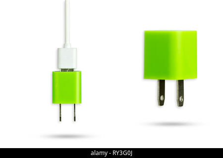 Green power adapter charger and white usb cable on isolate white background with clipping path. Stock Photo